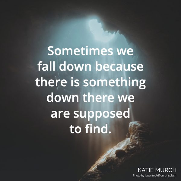 Quote is in front a dark cave with light shining down through an opening above. Katie Murch and photo credit is on the bottom right of the image.