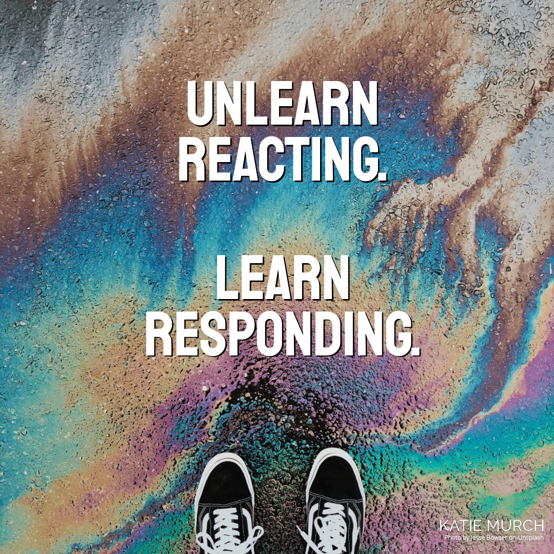 Quote is in front of the asphalt covered with oil reflecting various colors. A pair of black vans shoes can be seen on the bottom. Katie Murch and photo credit is on the bottom right of the image.